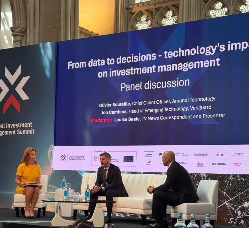 Jon Cambras speaking on a panel at the Global Investment Management Summit